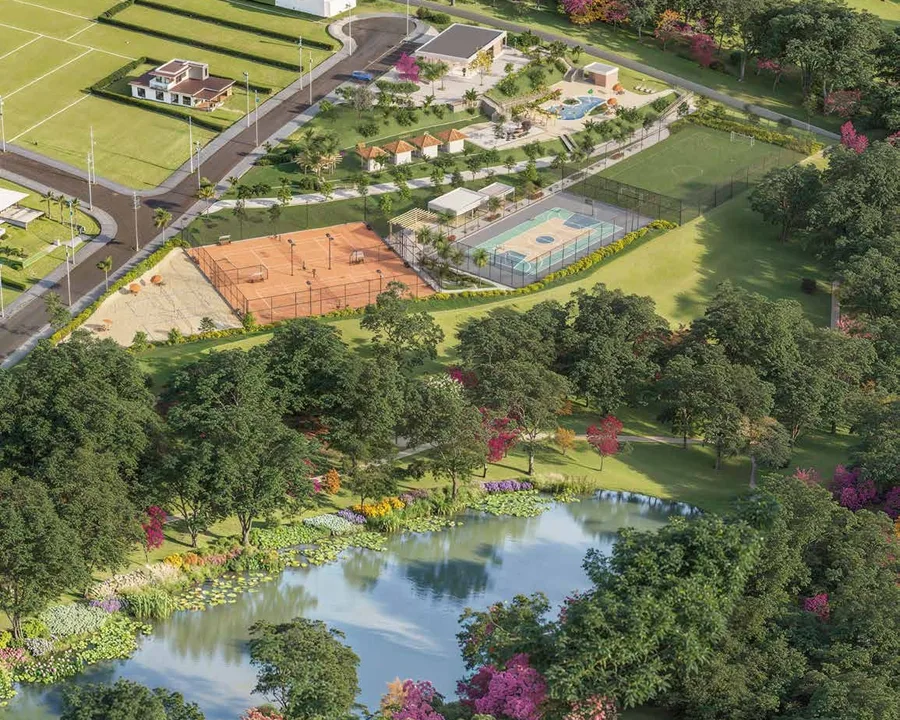 Vista aérea do club house, quadras e lago contemplativo do Quinta das Flores, condomínio de lotes em Hidrolândia